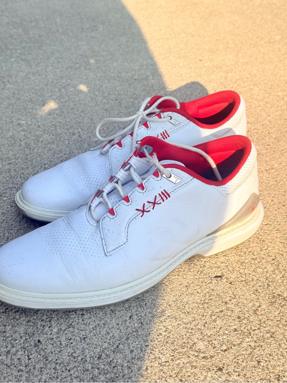 Jordan ADG 5 Golf Shoes in the White/Fire Red/Metallic Silver colorway
